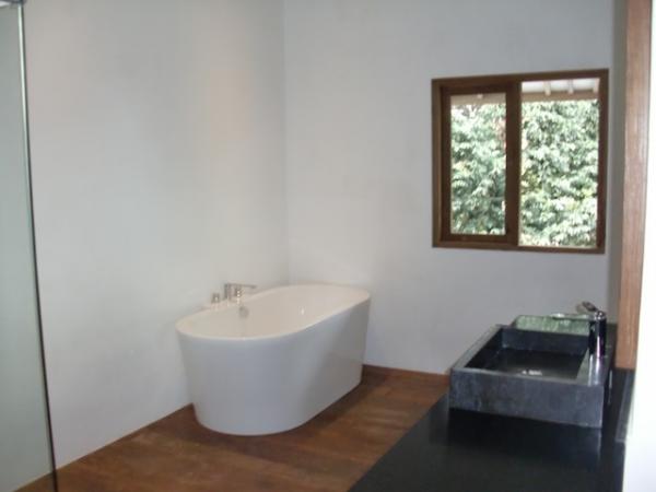 Master bathroom with bath-tub